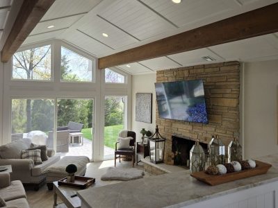 living room with brick fireplace