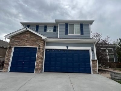 garage view of house and driveway after painting project